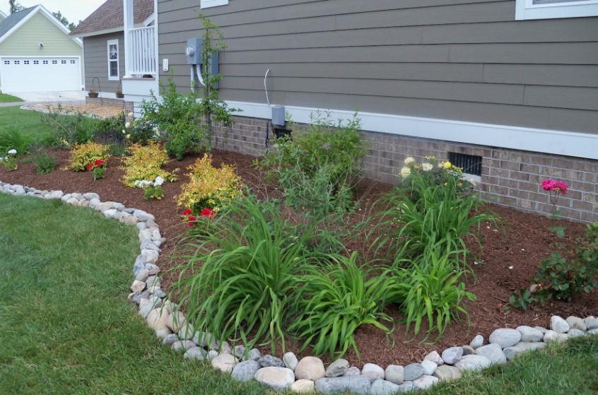 Stone lined flower bed